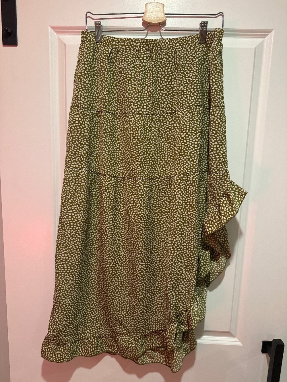 Olive green leaf print skirt with ruffled side hem